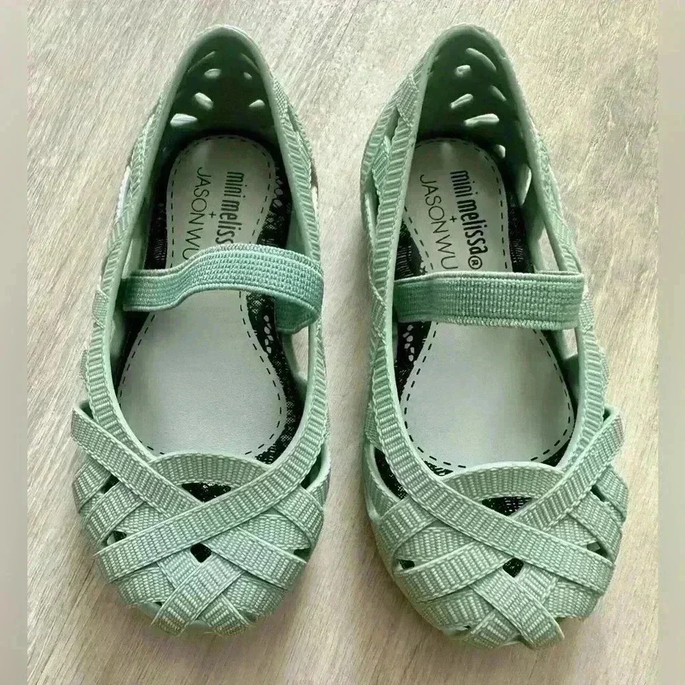 Mini Melissa adorning little